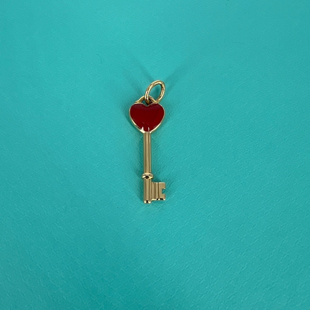 Red enamel and‎ yellow gold heart key